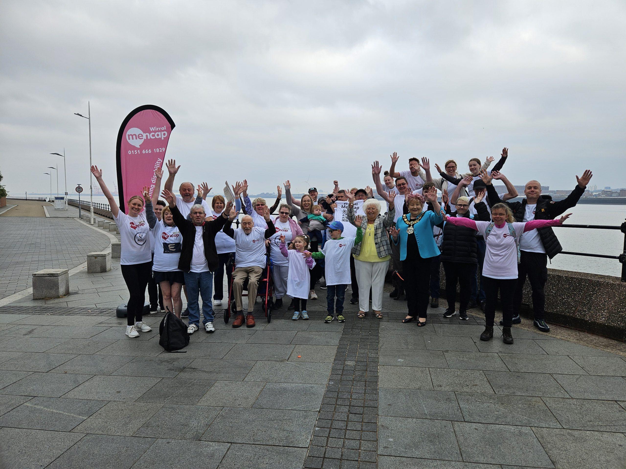 Walkers gather together to start the Seaside Walk