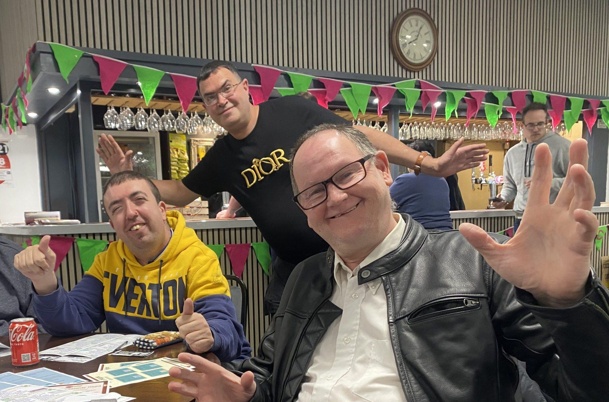 3 men smiling for the camera